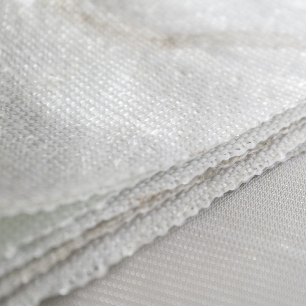 Au-delà de l'isolation : les avantages structurels et thermiques du tissu en fibre de verre tissé dans les applications industrielles