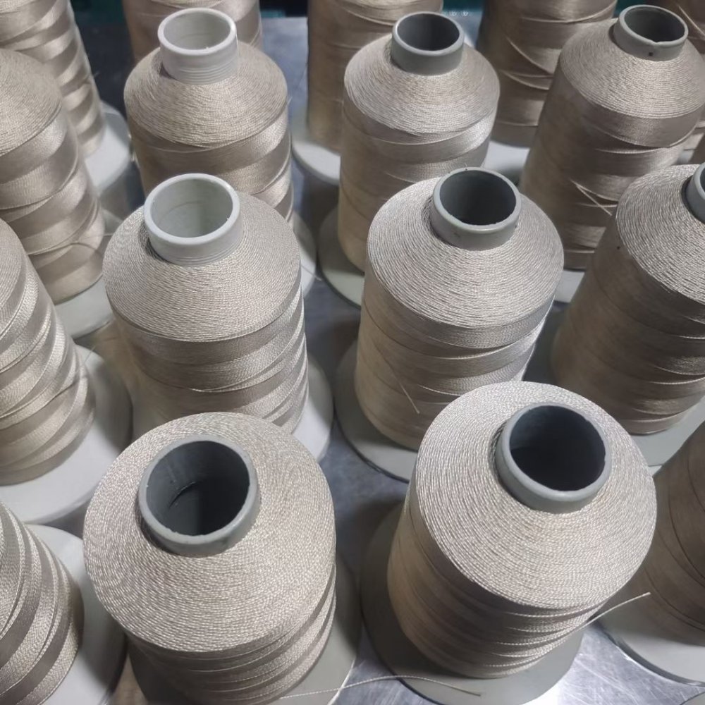 Fil à coudre en fibre de verre enduit de PTFE : taille d'aiguille, tension et rupture